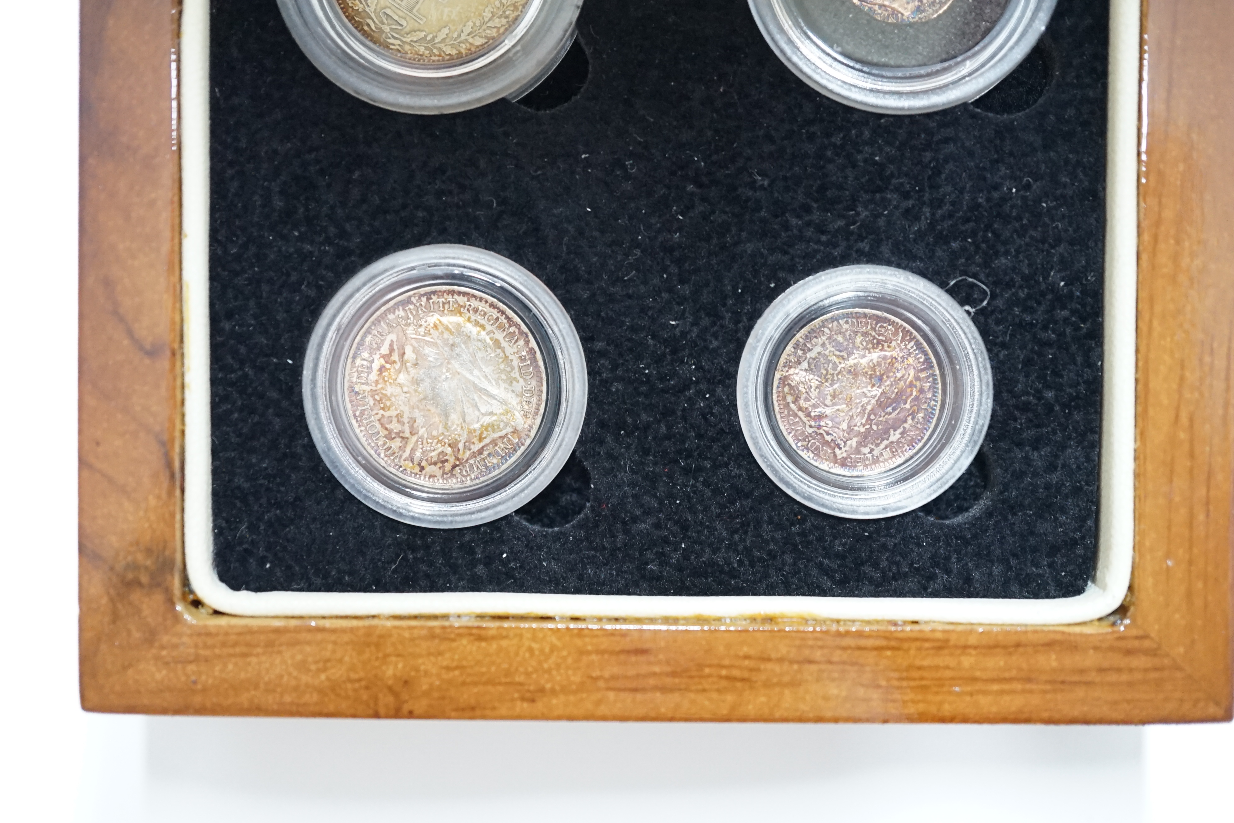 British silver coins, Victoria Veiled portrait four coin set of Maundy coins, 1897, toned UNC, in London Mint case